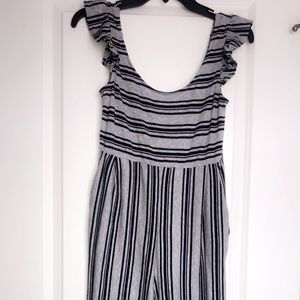 Brand new Women’s XS grey and navy jumpsuit